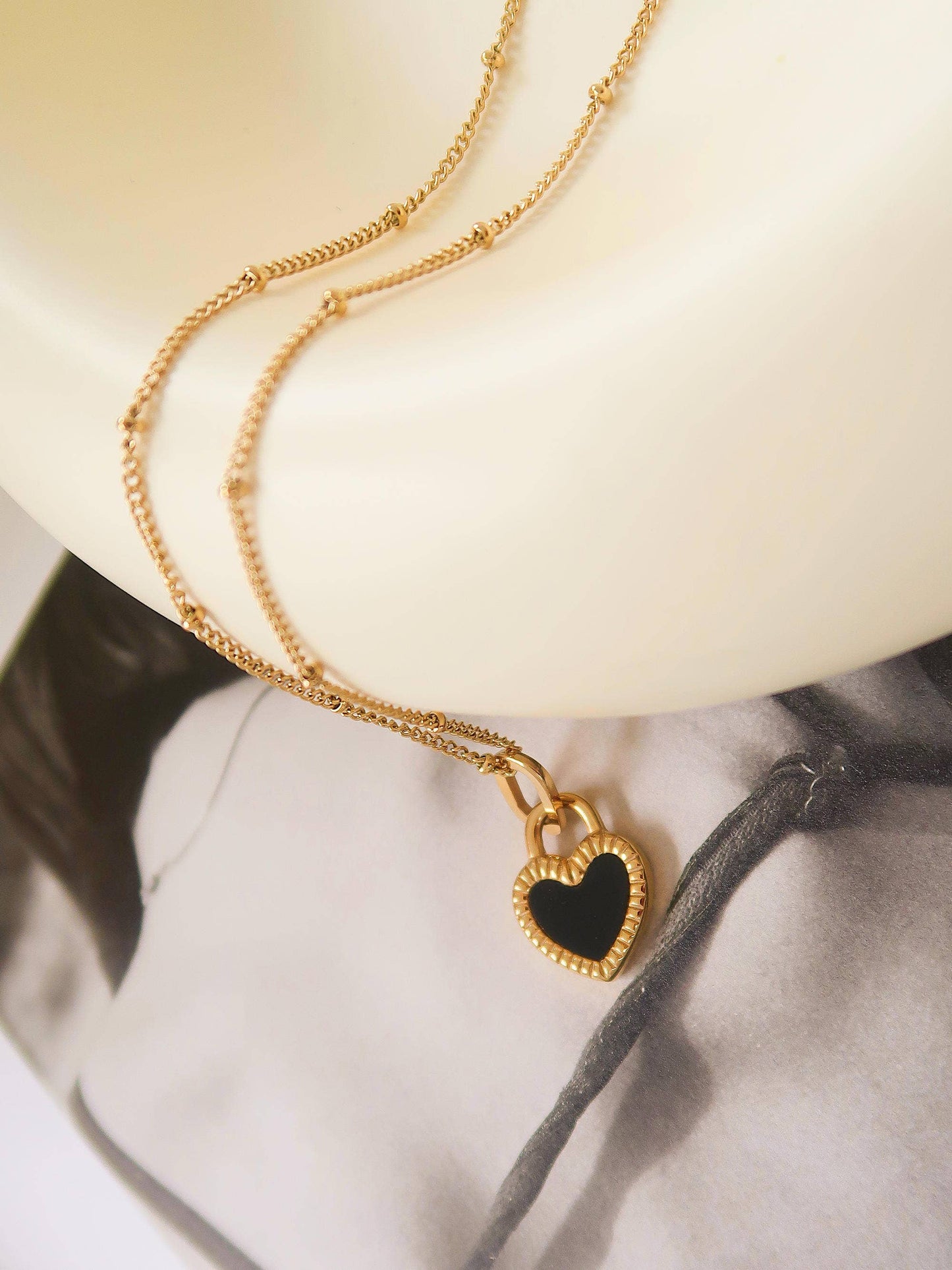 Kylie Non-Tarnish Double-Sided Black & White Heart Necklace